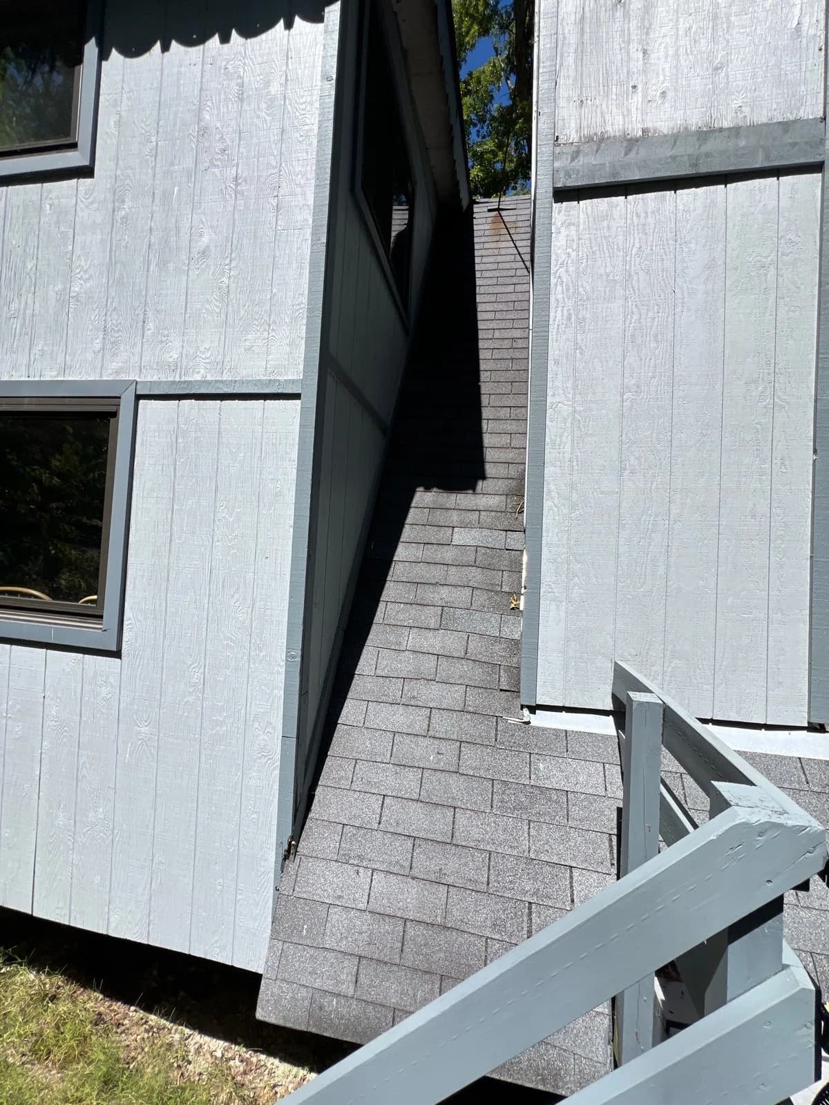 Freshly installed white fiber-cement siding with black metal trim on a Missouri home